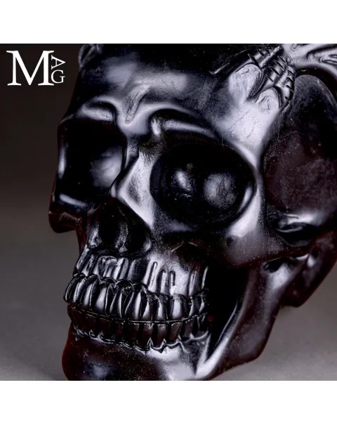 Scultura in Diaspro Nero – Teschio con Drago