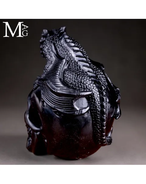 Scultura in Diaspro Nero – Teschio con Drago