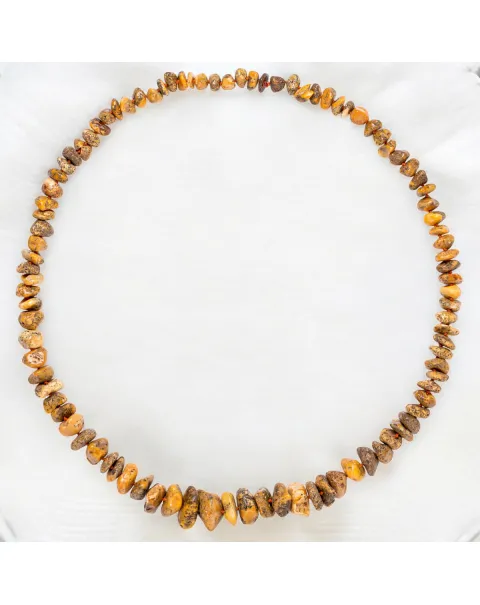 Collana di Ambra Non Lavorata: Forme Naturali e Fascino Primordiale.
