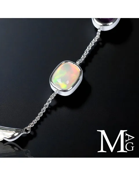 Collier con opale, ametista, smeraldo e diamante – ali in madreperla
