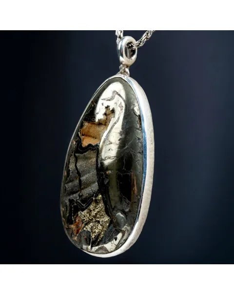 Antichi Riflessi: Argento con Ammonite Piritizzata.