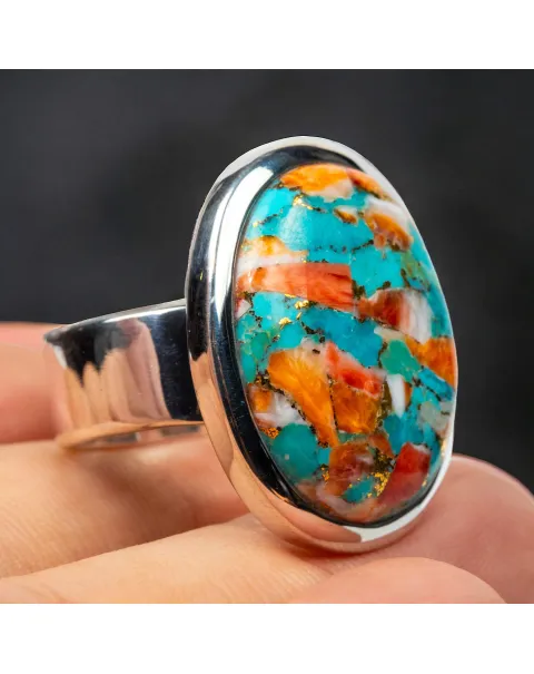 Anello in argento con gemma ovale di Spiny Oyster Turchese.