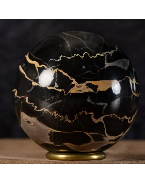 Sfera in Marmo Portoro.