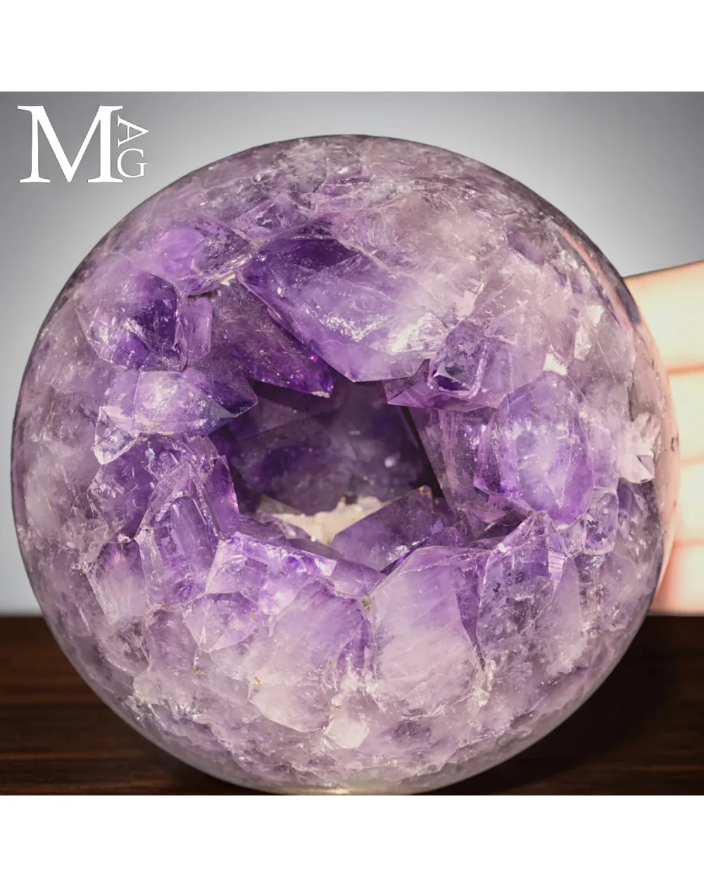 Sfera in Ametista Brasiliana da Geode con Cavità Naturale.