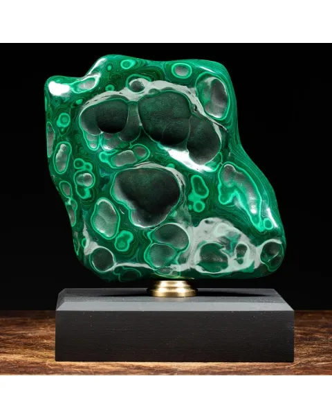 Malachite su piedistallo in legno e ottone