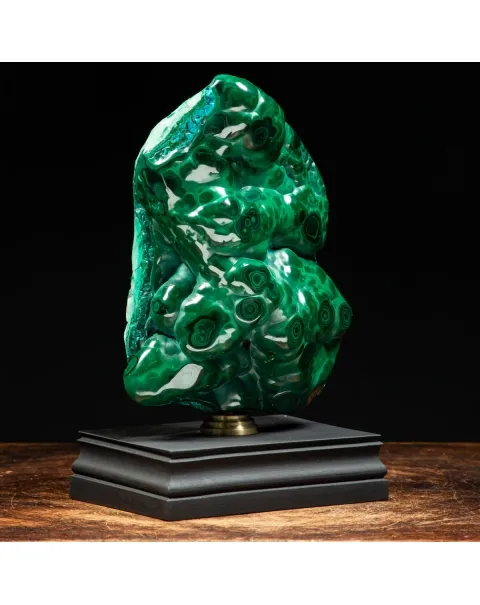 Malachite su piedistallo in legno e ottone