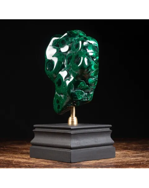 Malachite su piedistallo in legno e ottone