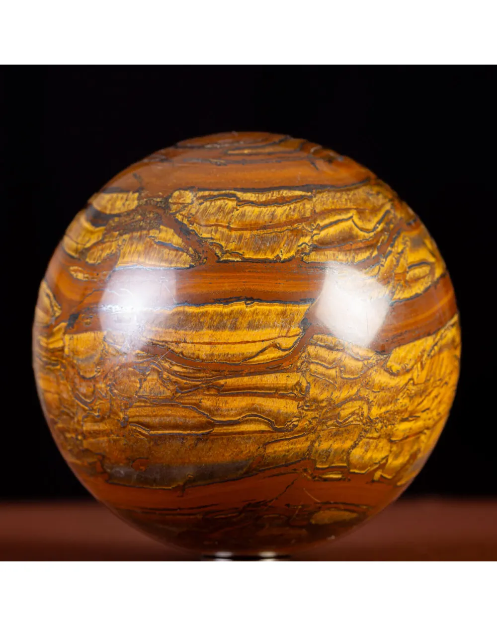 Sfera in Tiger Iron Intagliata.