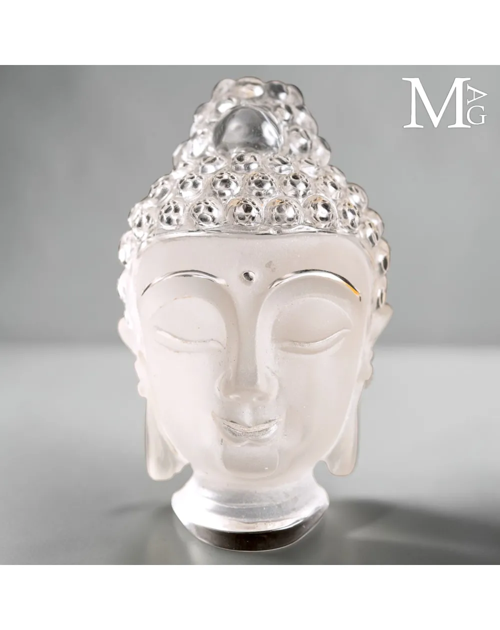 Testa di Buddha in Quarzo Extra Chiaro del Tibet.