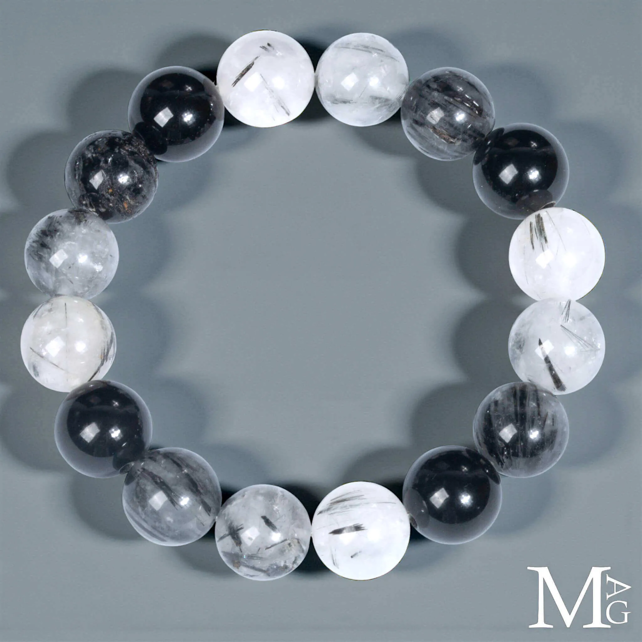 Bracciale in Quarzo Tormalinato e Onice Nero – Sfere da 12,5 mm