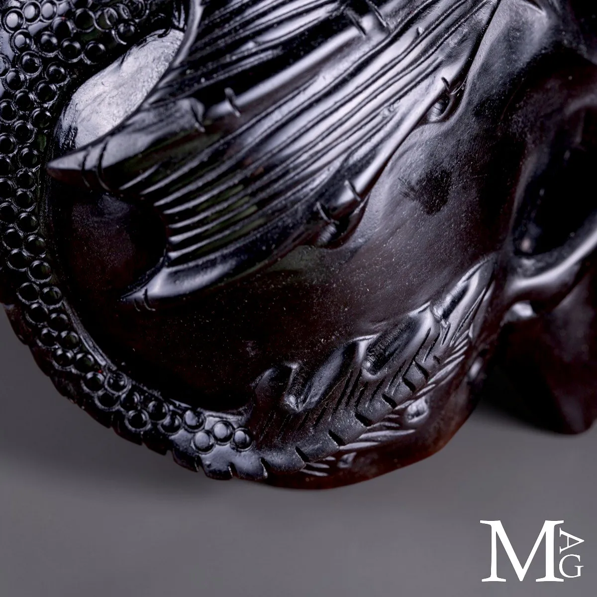 Scultura in Diaspro Nero – Teschio con Drago