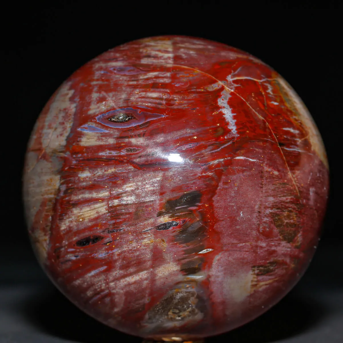 Sfera in Legno Fossile Rosso.