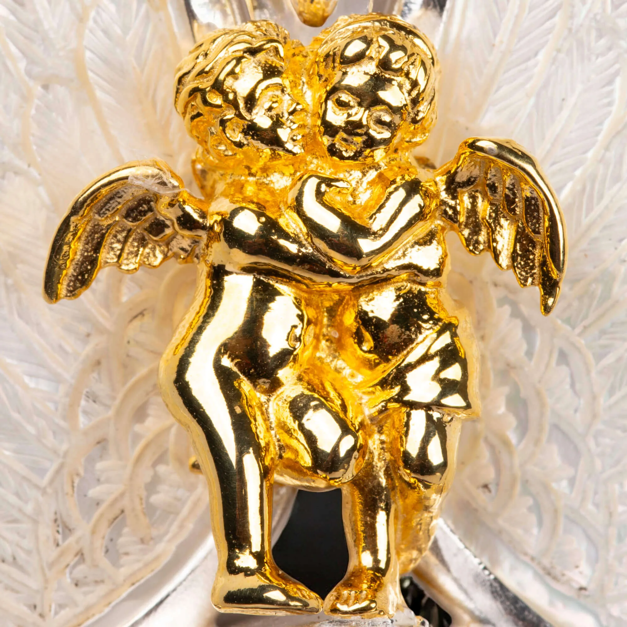 Gioiello in Oro e Argento: Cherubini e Gemme Preziose.