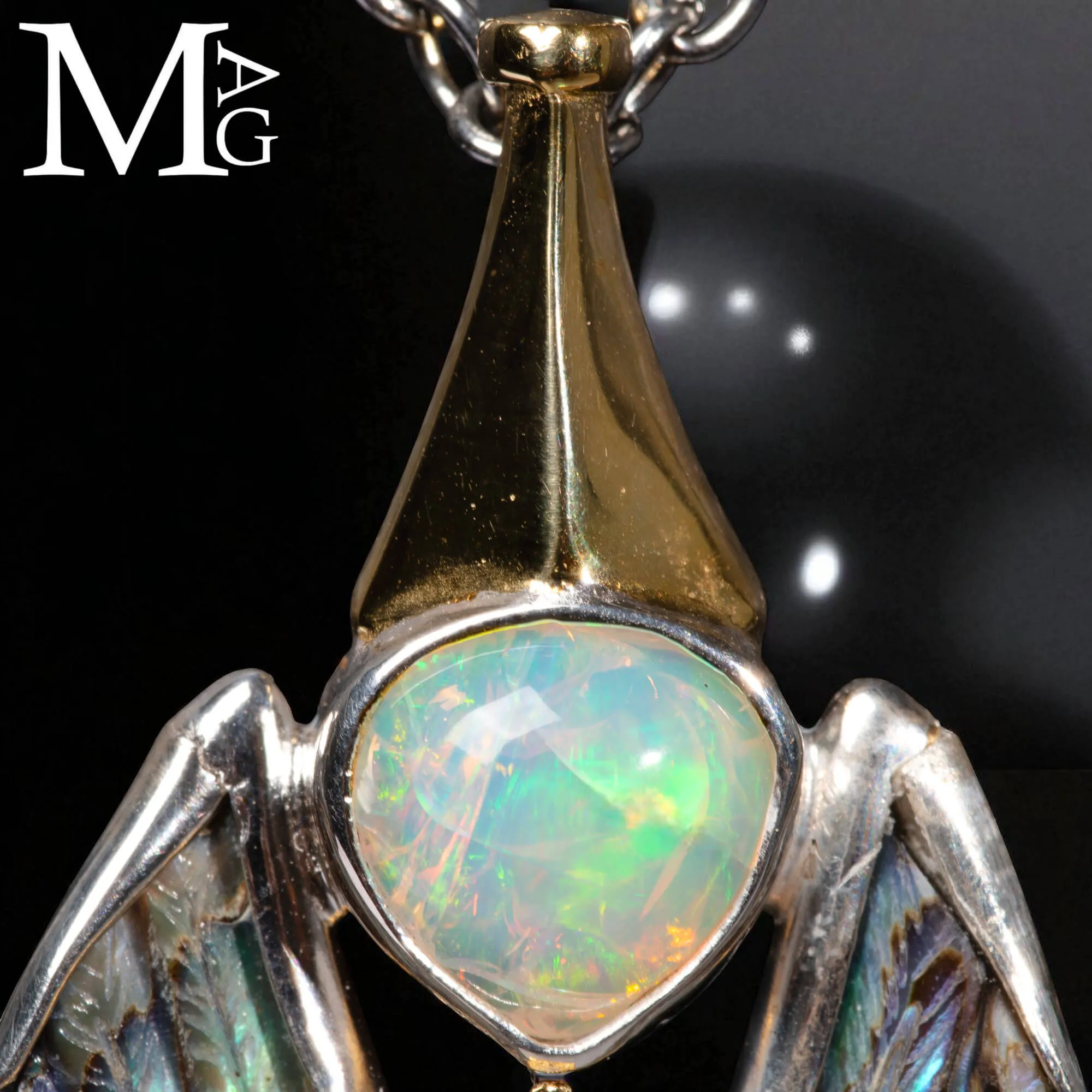Gioiello in Argento con Buddha, Larimar, Opale, Paua Shell e Diamantino.