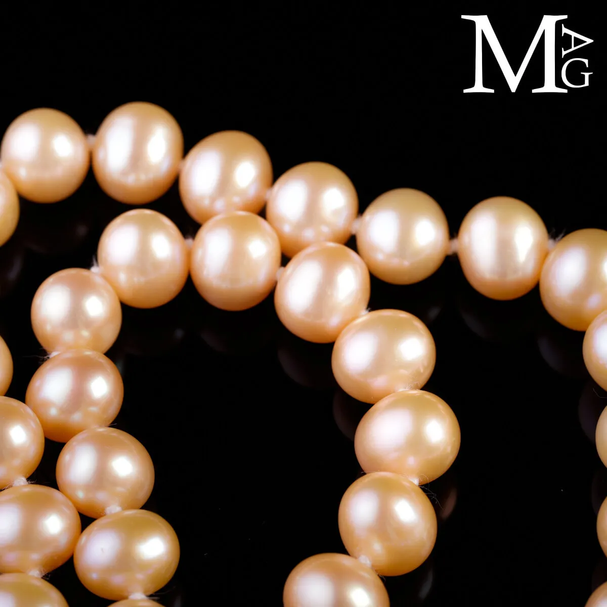 Collana in perle forma ovale – Rosa crema.