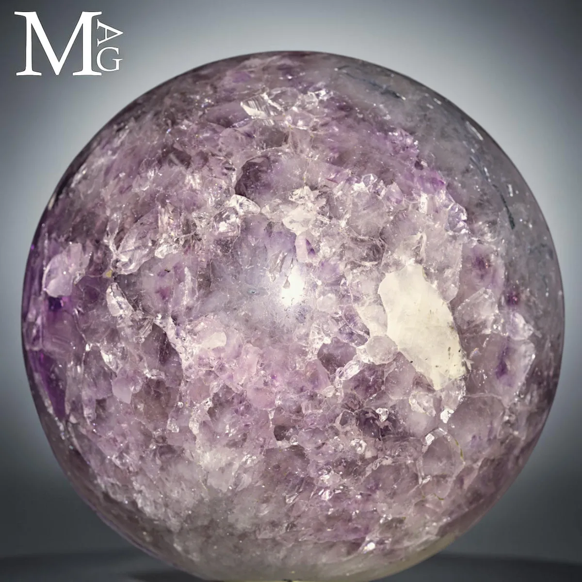 Sfera in Ametista Brasiliana da Geode con Cavità Naturale.