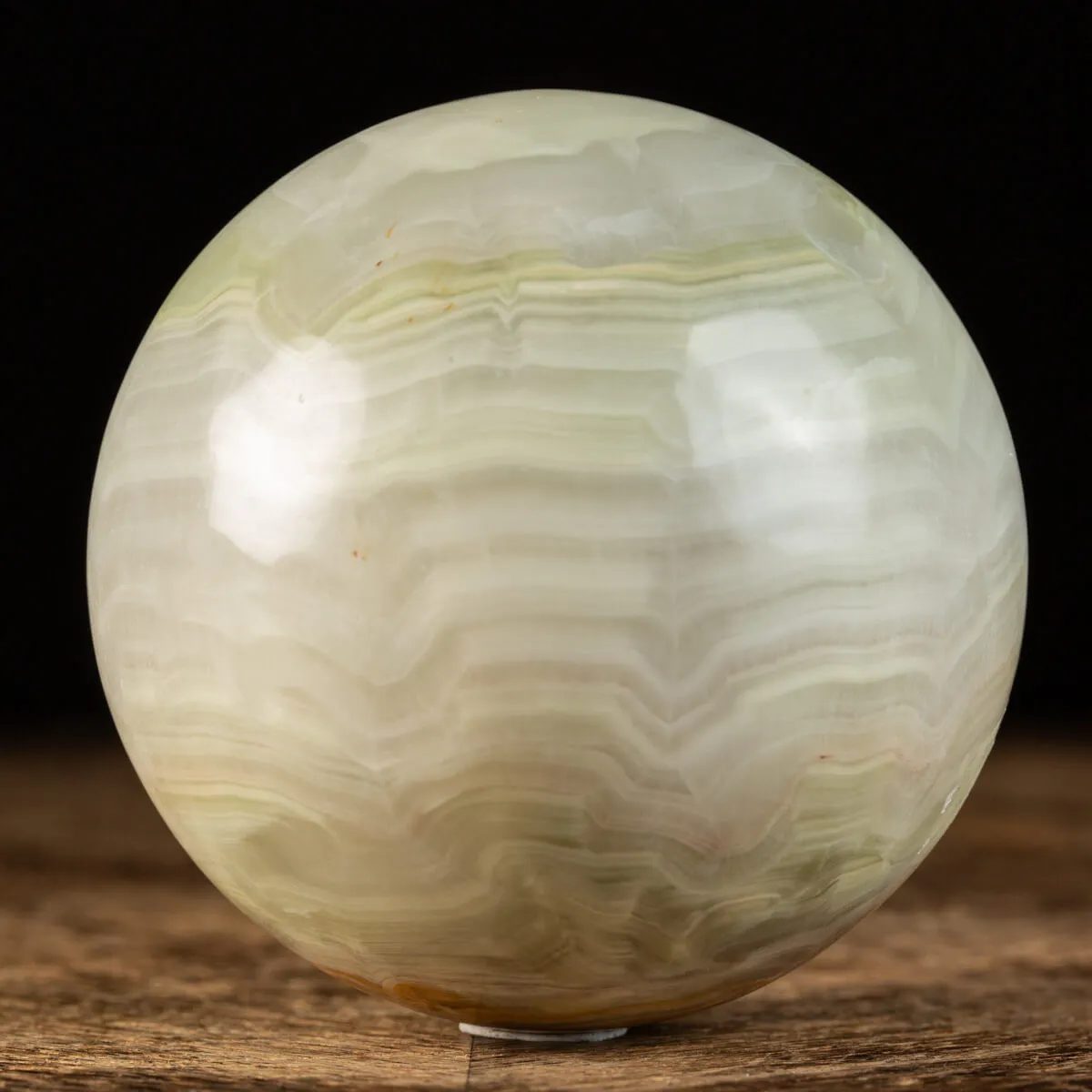 Sfera di onice verde con bande.