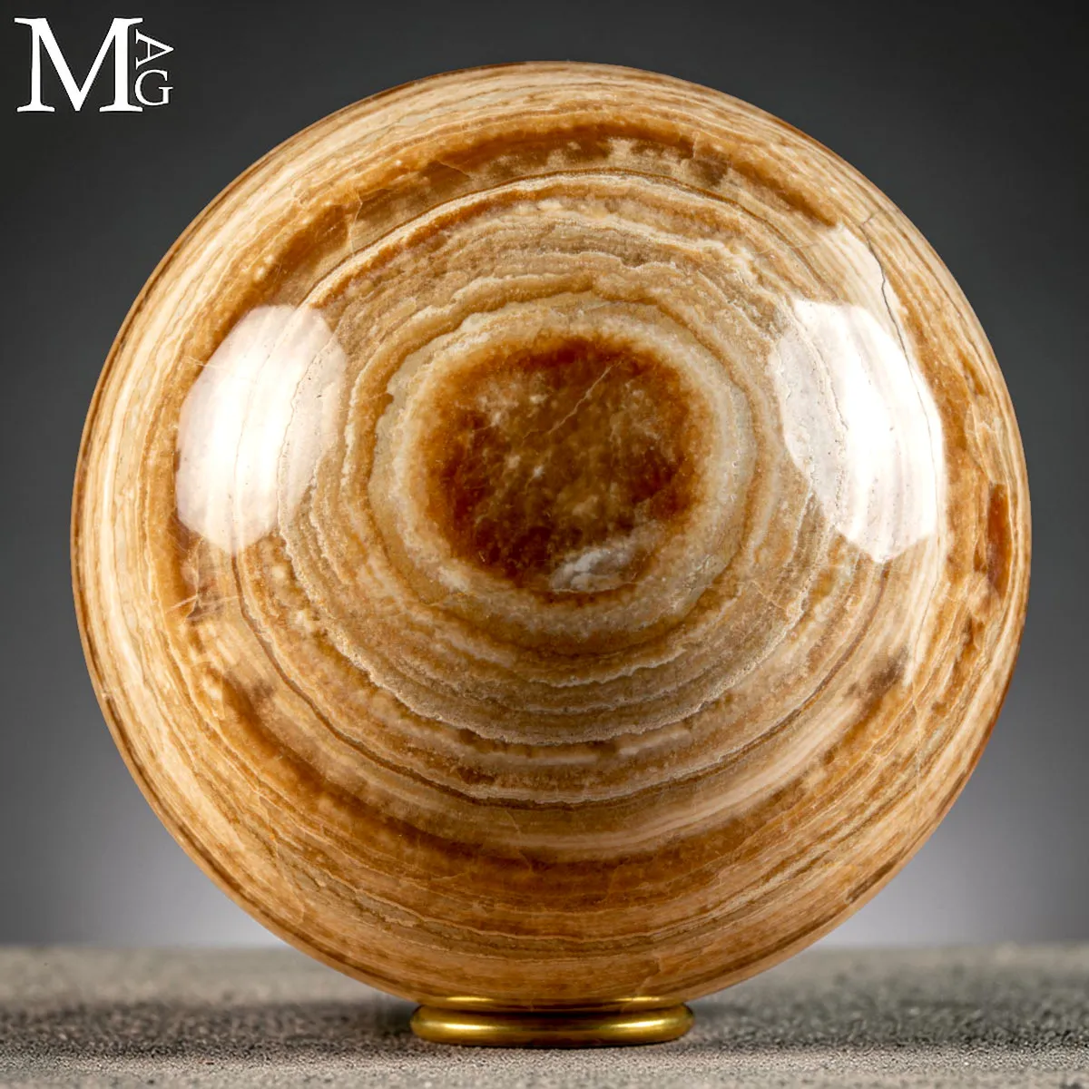 Sfera in Onice Messicano Naturale con Bande Calcaree Lucidate
