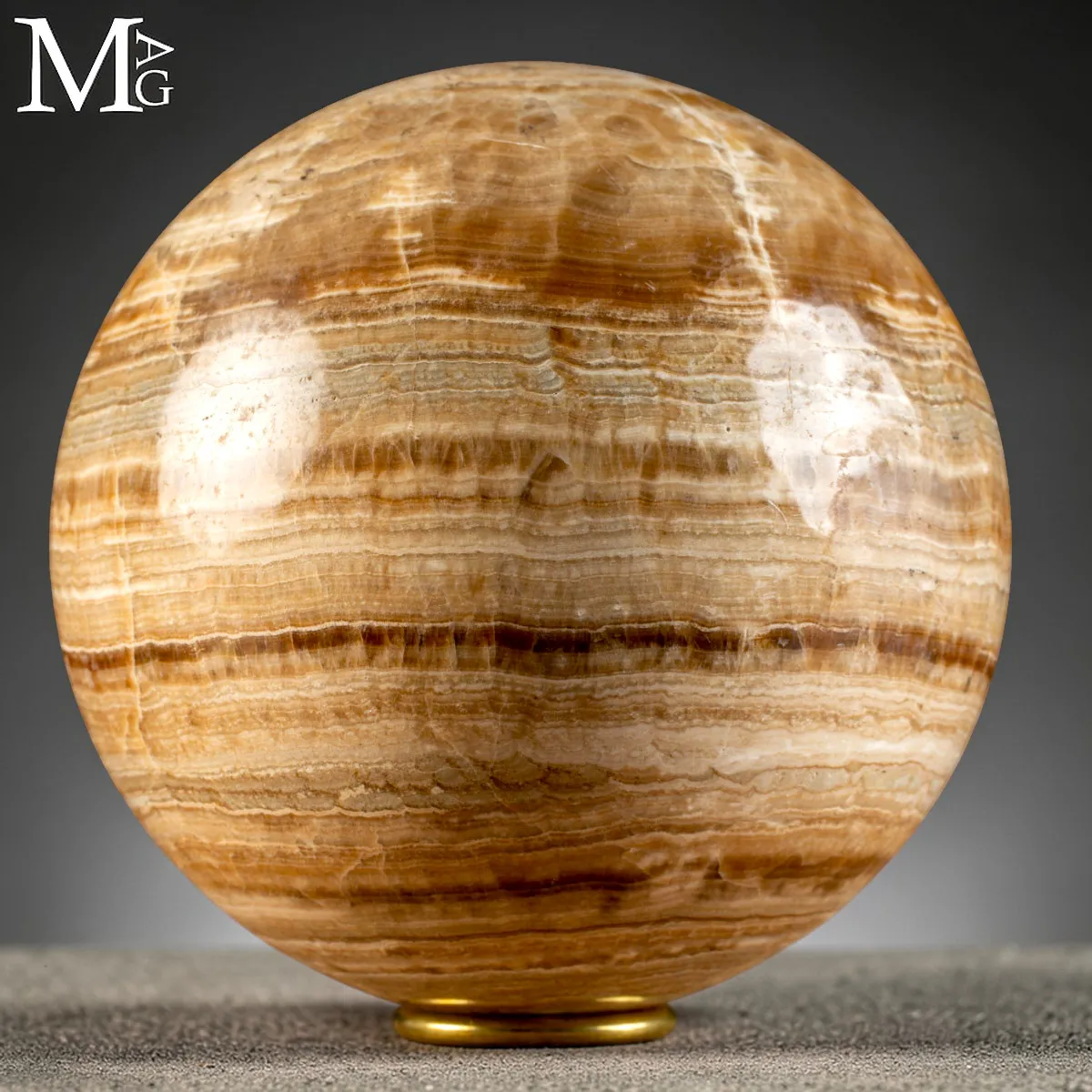 Sfera in Onice Messicano Naturale con Bande Calcaree Lucidate