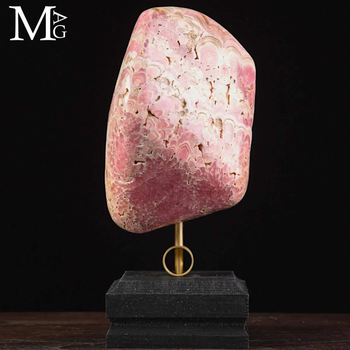 Rodocrosite –  campione levigato su base in ottone e legno.