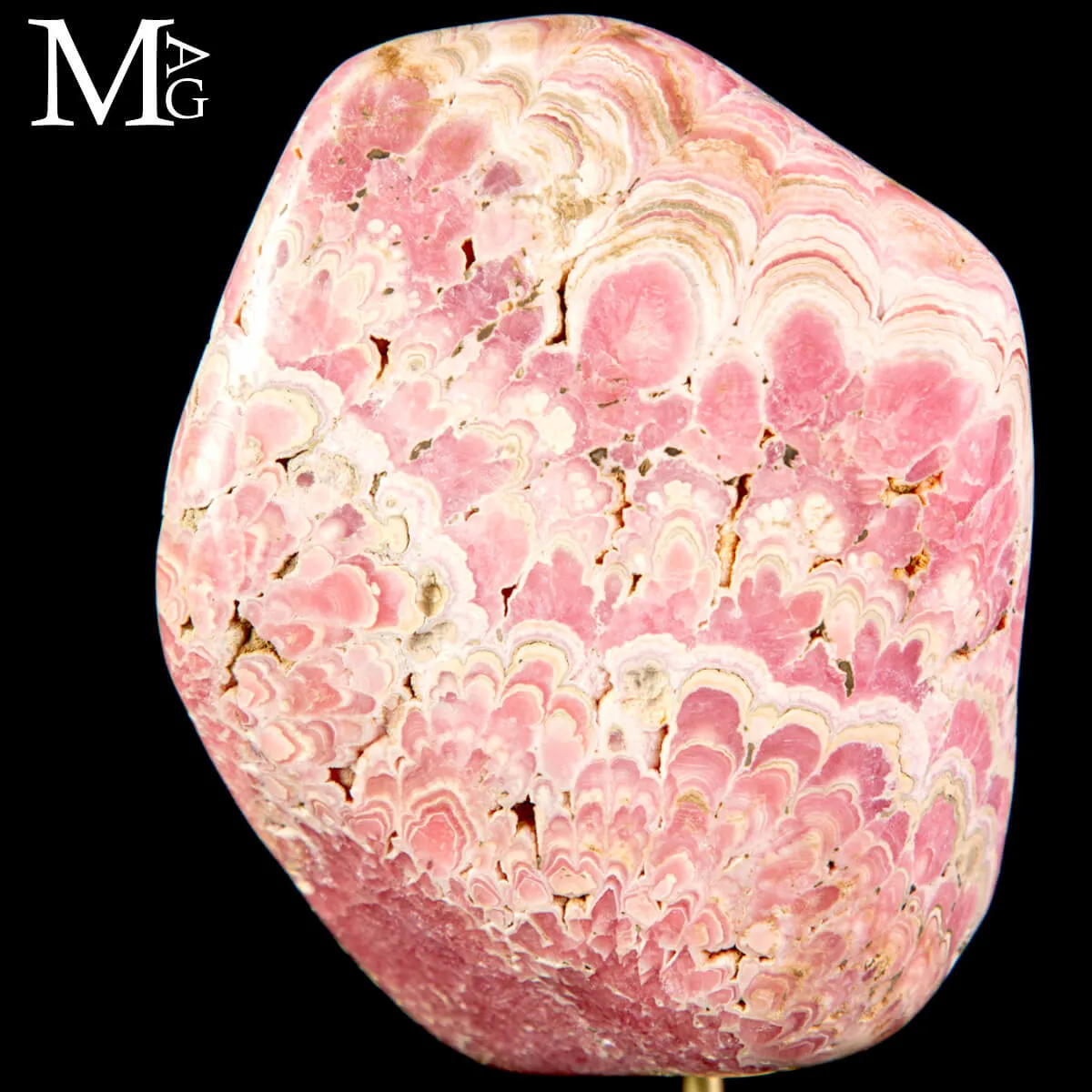 Rodocrosite –  campione levigato su base in ottone e legno.
