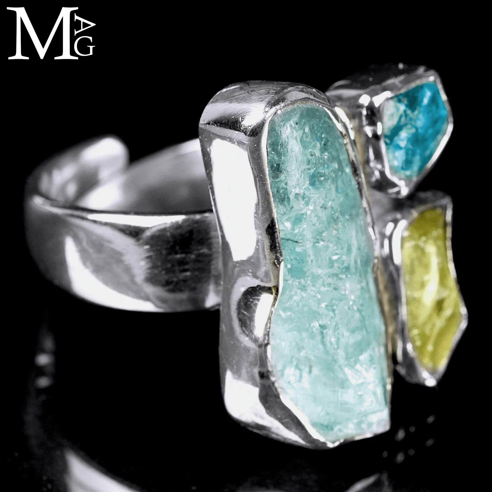 Anello in Argento con Acquamarina, Heliodoro e Apatite Neon.