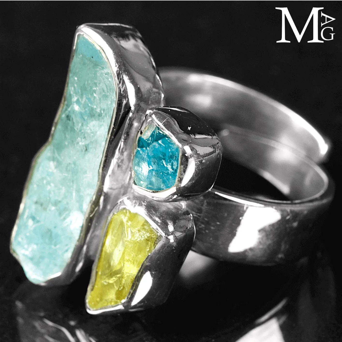 Anello in Argento con Acquamarina, Heliodoro e Apatite Neon.