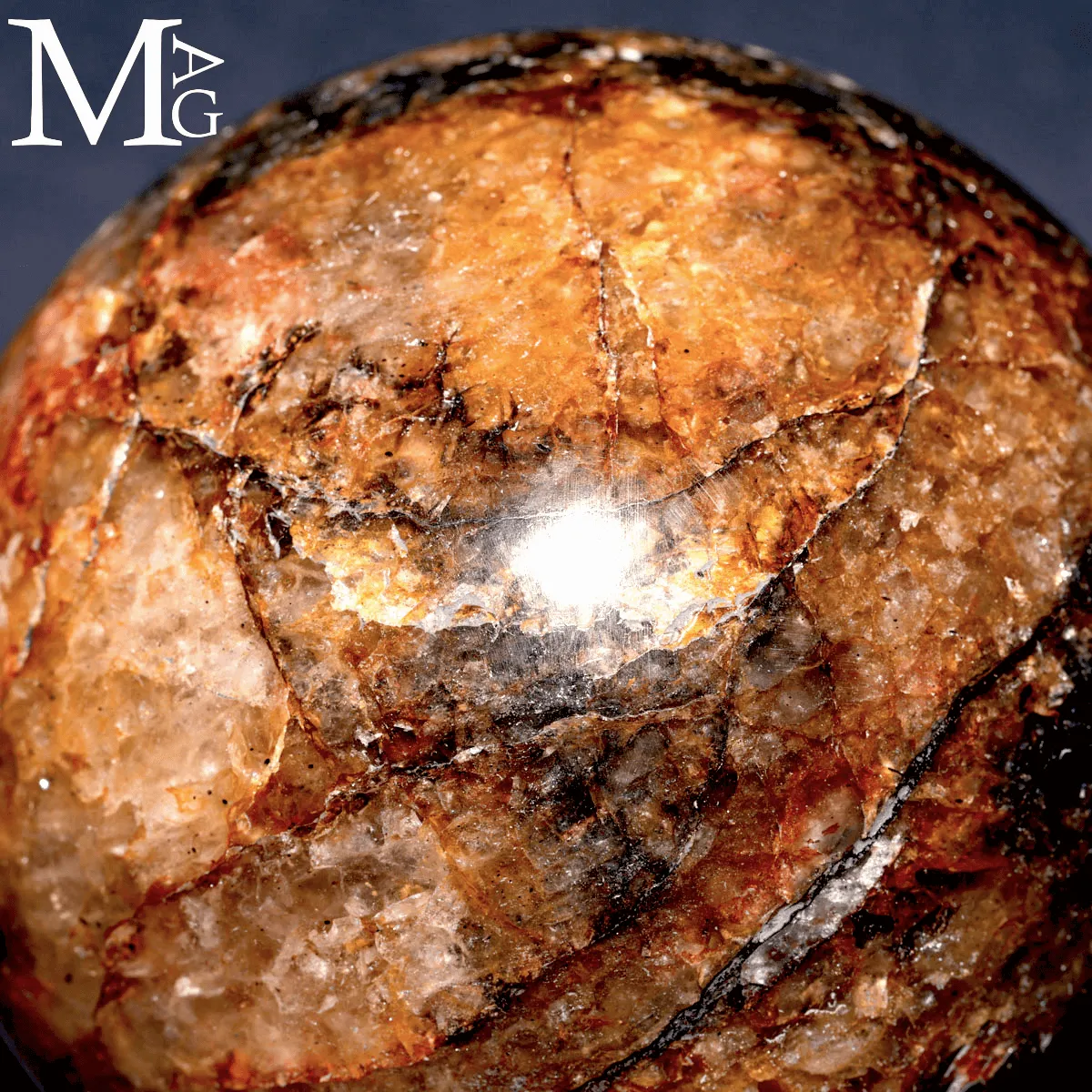 Sfera in Quarzo Ematoide con Inclusioni Ferrifere.