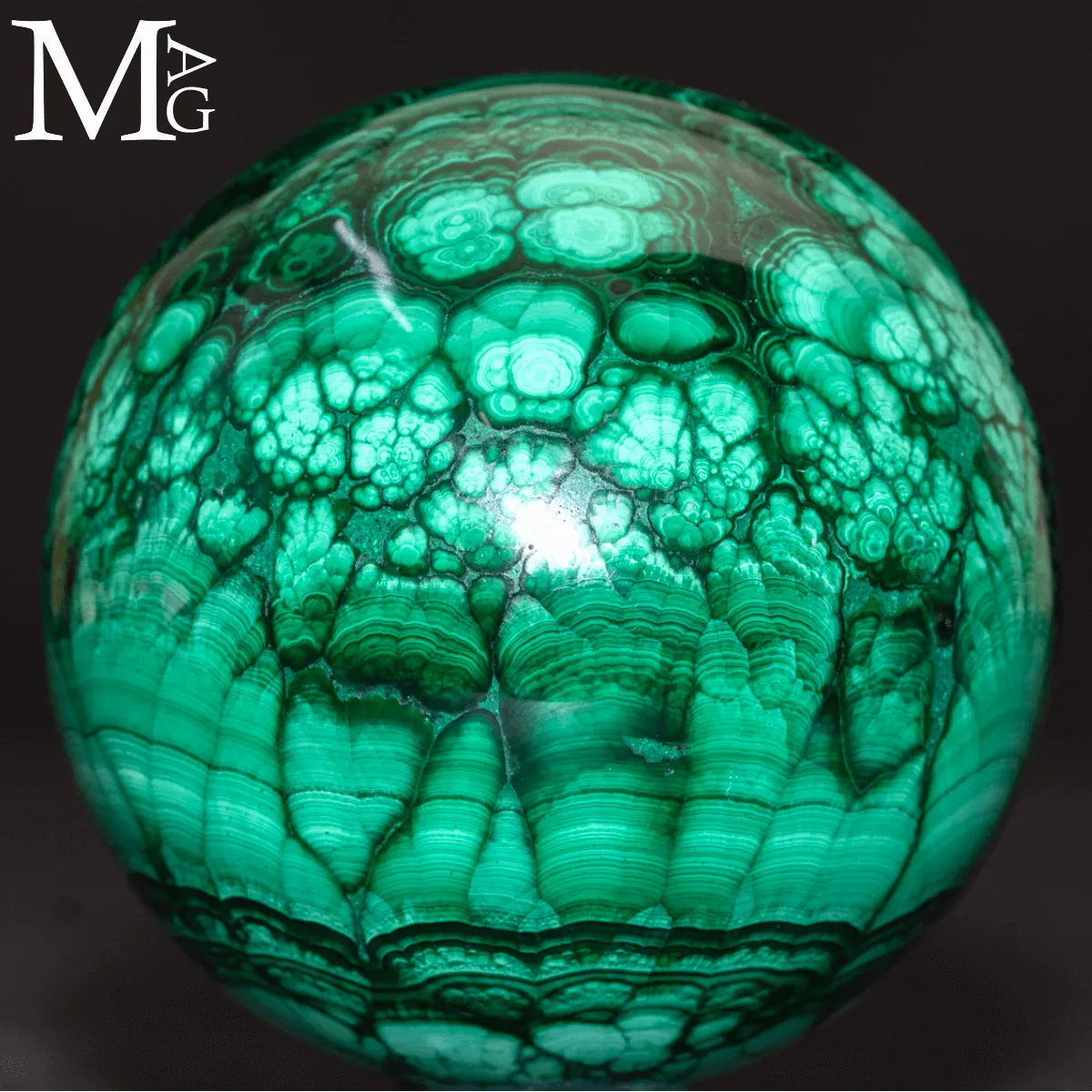 Sfera in Malachite – Il Linguaggio delle Forme.